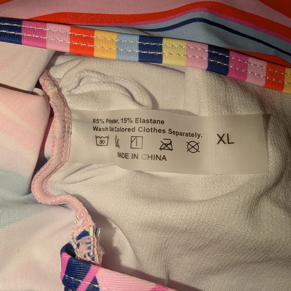 Vibrant Red and Blue One Piece with Artistic Swirls - Picture 7 of 7